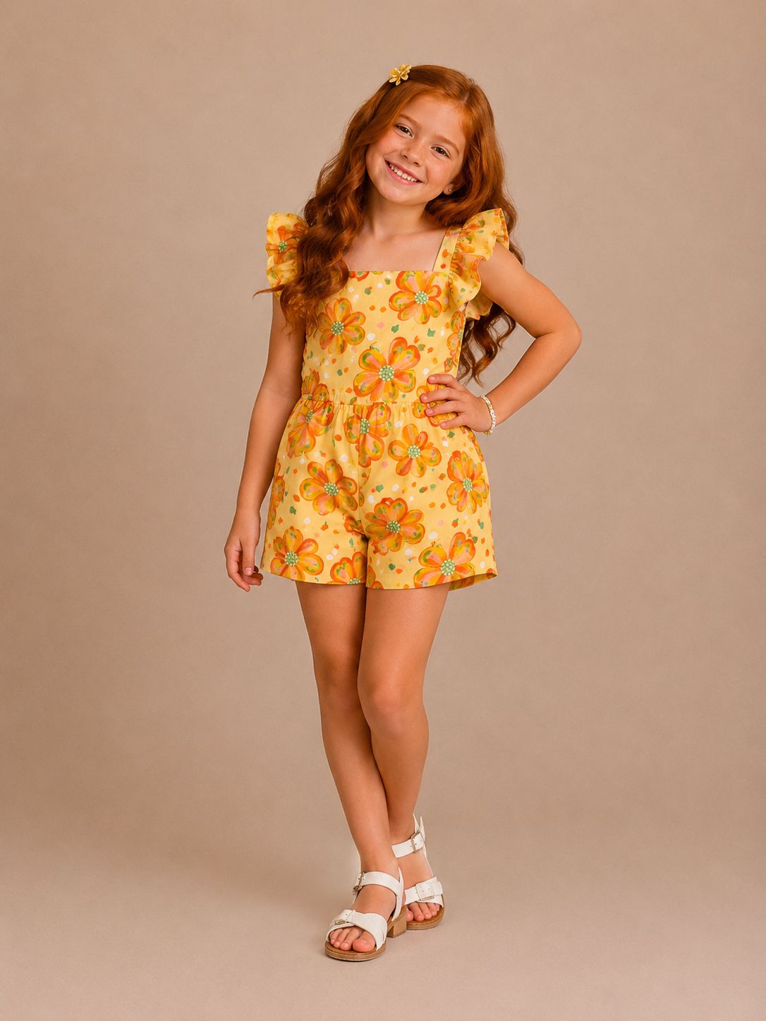 Macaquinho infantil amarelo com estampa floral exclusiva e babados nas alças